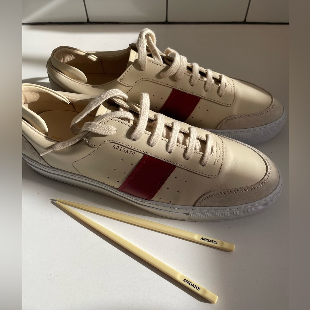 Never Worn special edition Axel Arigato Men’s sneakers with branded chopsticks.